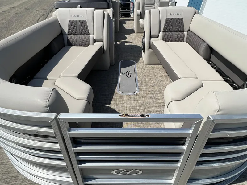 Slide: The Image of 2020 Harris FloteBote H SOL 250 CWDH TT pontoon boat interior with plush seating. - 13