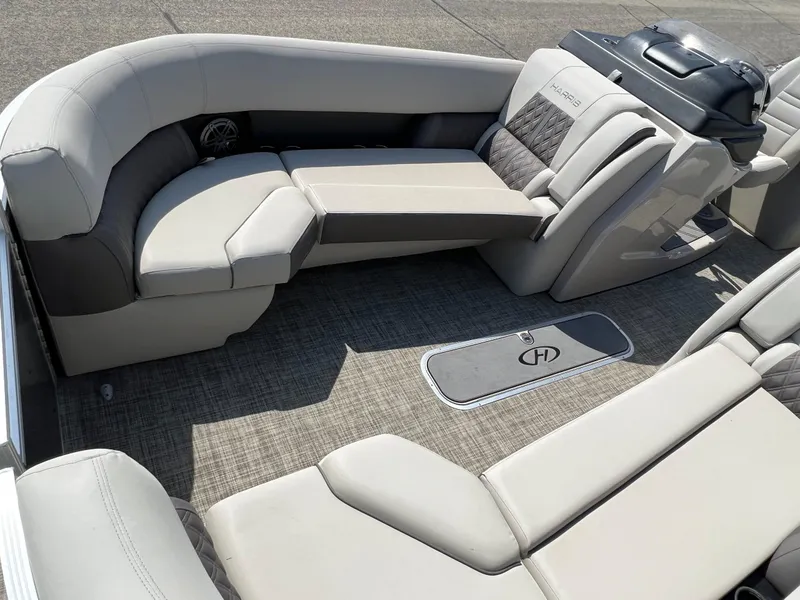 Slide: The Image of Luxurious 2020 Harris FloteBote H SOL 250 CWDH TT pontoon boat interior with plush seating. - 14
