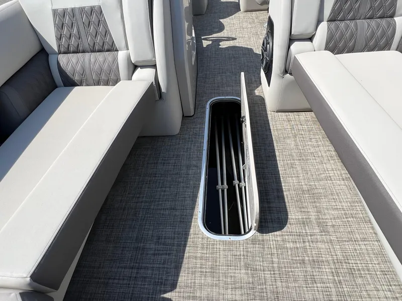 Slide: The Image of 2020 Harris FloteBote H SOL 250 CWDH TT interior with open floor storage compartment. - 17