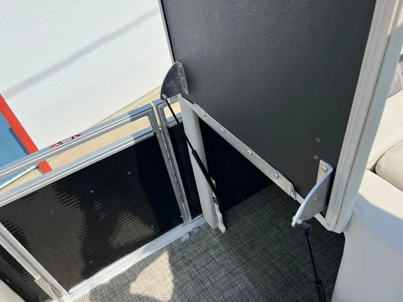 Slide: The Image of 2020 Harris FloteBote H SOL 250 CWDH TT interior detail, featuring door and flooring. - 23
