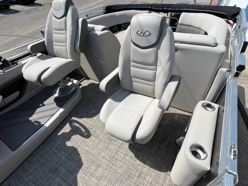 Slide: The Image of 2020 Harris FloteBote H SOL 250 CWDH TT pontoon boat interior with plush seating. - 29