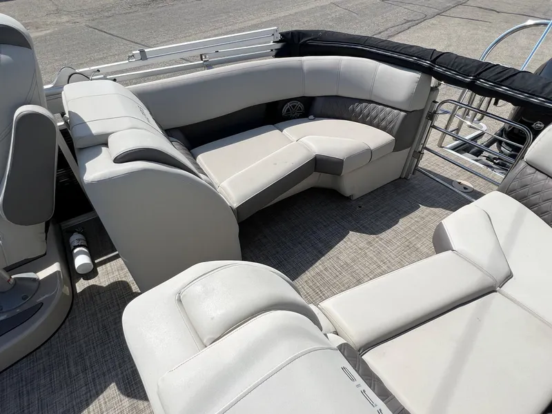 Slide: The Image of 2020 Harris FloteBote H SOL 250 CWDH TT pontoon boat interior with plush seating. - 30