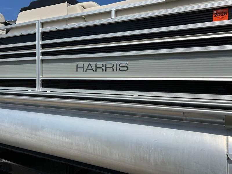 Slide: The Image of 2020 Harris FloteBote H SOL 250 CWDH TT pontoon boat side view. - 6