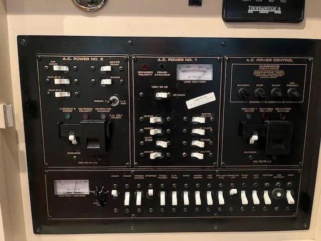 Slide: The Image of Electrical control panel on a 2001 Cruisers Yachts 3470 Express boat. - 18