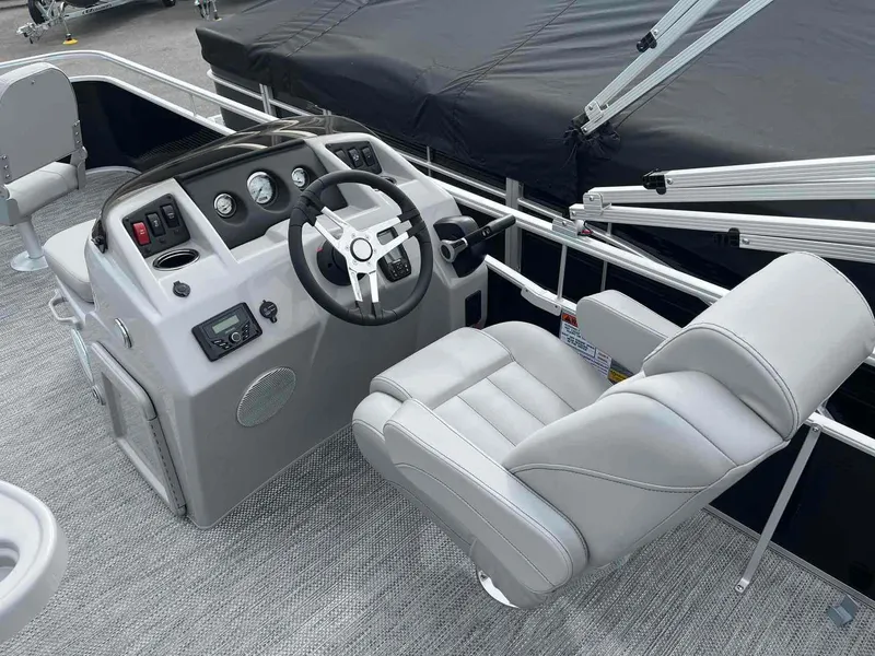 Slide: The Image of 2024 Bennington 20 SVF boat interior with modern helm and comfortable seating. - 6