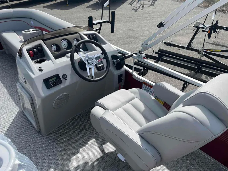 Slide: The Image of 2024 Bennington 20 SVL boat interior with steering console and seating. - 14