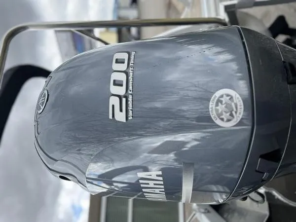 Slide: The Image of Yamaha 200 outboard motor on 2023 Bennington 22 SL boat. - 11