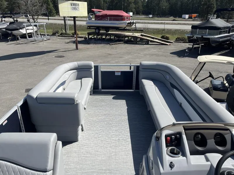 Slide: The Image of 2023 Bennington 22 SL pontoon boat interior with spacious seating and modern design. - 4