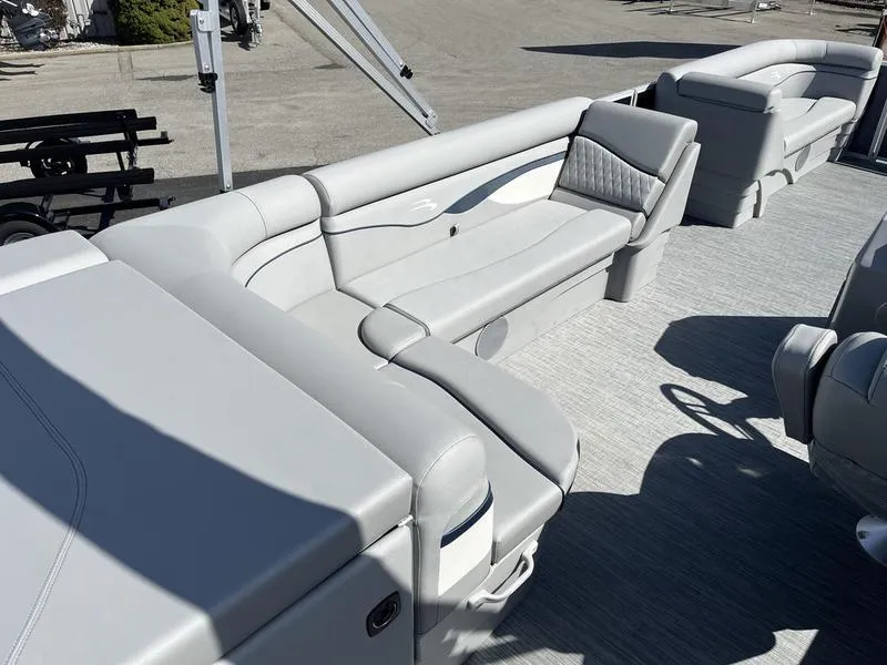 Slide: The Image of 2023 Bennington 22 SL pontoon boat interior with plush seating and modern design. - 6