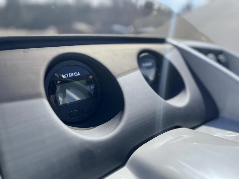 Slide: The Image of Close-up of Yamaha tachometer on 2023 Bennington 22 SL boat dashboard. - 8