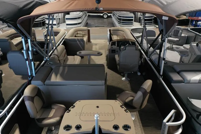 Slide: The Image of 2023 Bennington 22 SS pontoon boat interior with seating and canopy. - 14