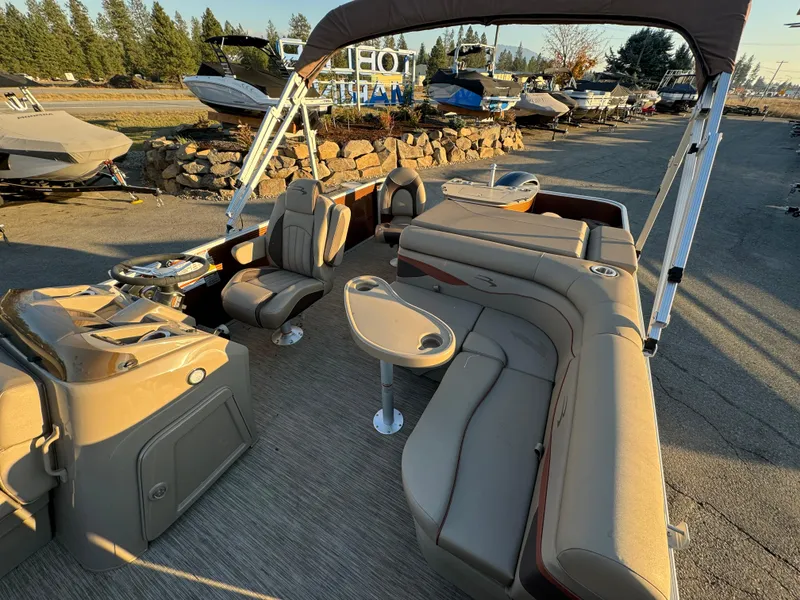 Slide: The Image of 2023 Bennington 22 SS pontoon boat with spacious seating and modern design. - 5