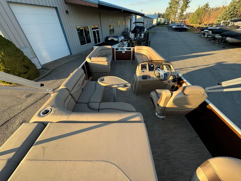 Slide: The Image of 2023 Bennington 22 SS pontoon boat with spacious seating and modern helm. - 8