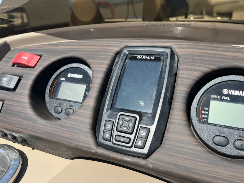 Slide: The Image of Dashboard of 2023 Bennington 22 SXFAPG with Garmin and Yamaha gauges. - 14
