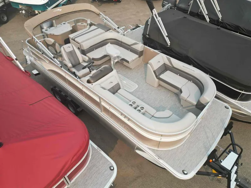 Slide: The Image of 2023 Bennington 22 SXSAPG pontoon boat with spacious seating and modern design. - 2