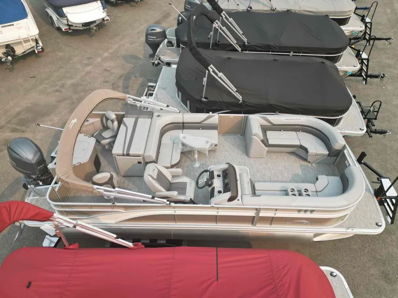 Slide: The Image of 2023 Bennington 22 SXSAPG pontoon boat with spacious seating and modern design. - 4