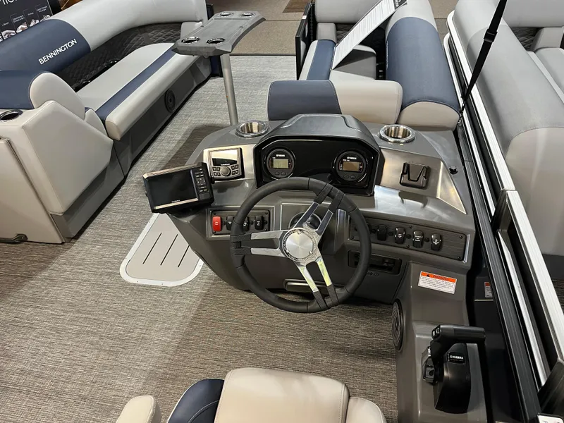 Slide: The Image of 2024 Bennington 22SSB-SPS boat interior with steering console and seating. - 16