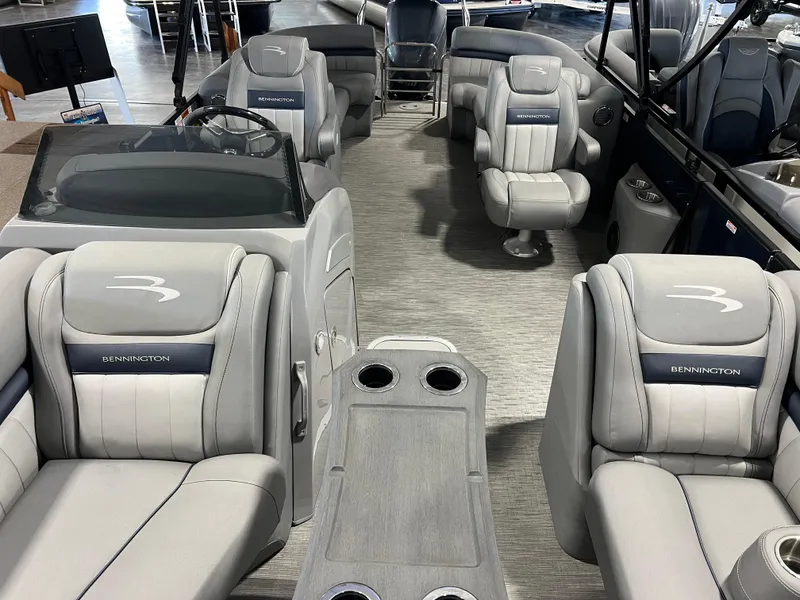 Slide: The Image of 2023 Bennington 23 LXFB boat interior with luxurious seating and modern design. - 4