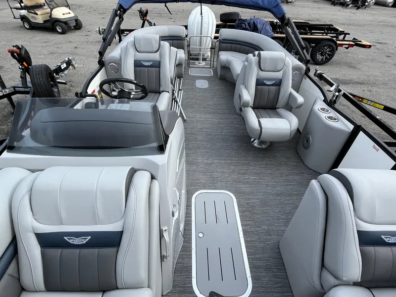 Slide: The Image of 2024 Bennington 24LXSFB pontoon boat interior with luxurious seating and modern design. - 10