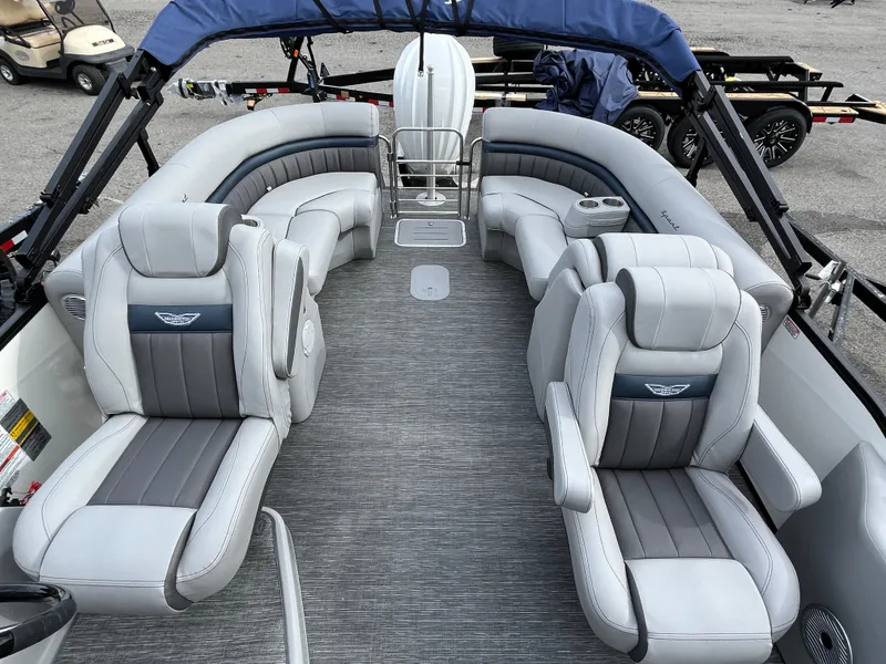 Slide: The Image of 2024 Bennington 24LXSFB pontoon boat interior with luxurious seating and modern design. - 11
