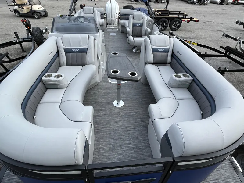 Slide: The Image of 2024 Bennington 24LXSFB pontoon boat with luxurious seating and modern design. - 9
