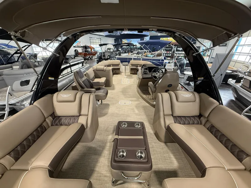Slide: The Image of Luxurious interior of 2024 Bennington 28 QXFBAX1 pontoon boat with plush seating and modern design. - 10