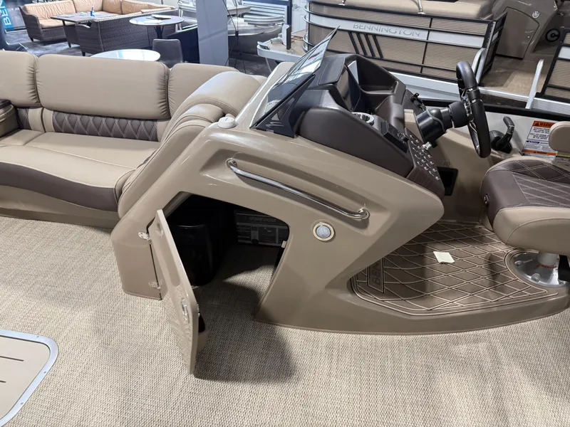 Slide: The Image of 2024 Bennington 28 QXFBAX1 boat interior with helm and seating area. - 13
