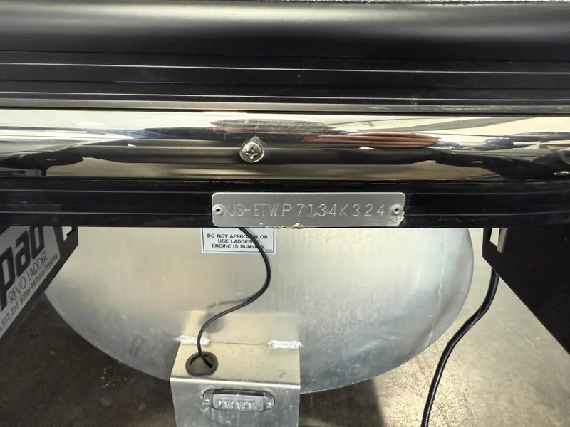 Slide: The Image of 2024 Bennington 28 QXFBAX1 boat hull identification number plate close-up. - 15