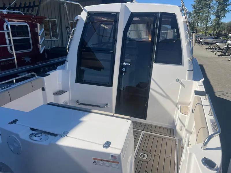 Slide: The Image of 2023 Cutwater C-248 C boat deck with seating and storage compartments. - 10