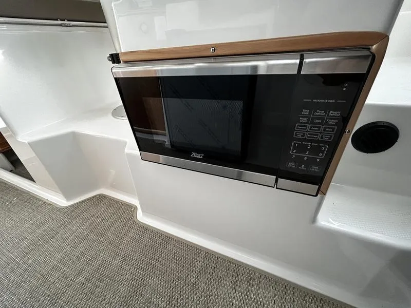 Slide: The Image of 2023 Cutwater C-248 C interior with built-in microwave oven. - 20