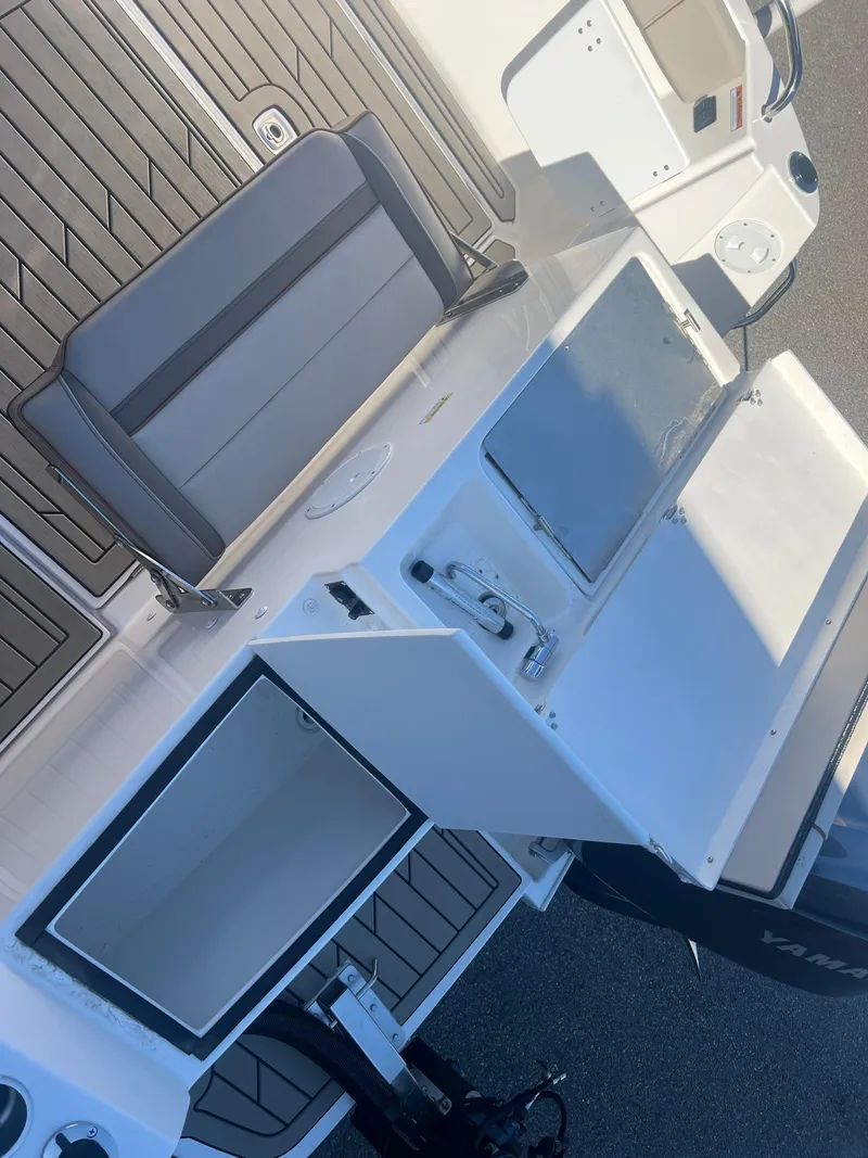 Slide: The Image of 2023 Cutwater C-248 C boat interior with seating and storage compartments. - 22