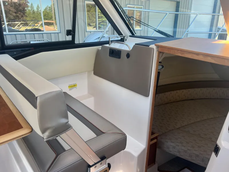Slide: The Image of 2023 Cutwater C-248 C interior with seating and cabin view. - 35
