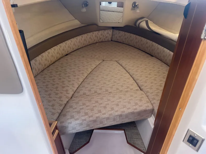 Slide: The Image of 2023 Cutwater C-248 C cabin interior with cushioned seating and modern design. - 38