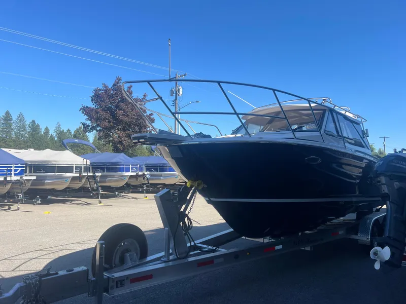 Slide: The Image of 2023 Cutwater C-248 C boat on trailer in sunny outdoor setting. - 4