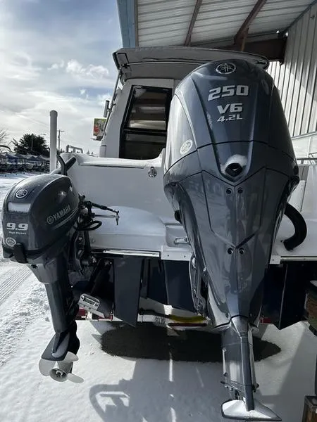 Slide: The Image of 2023 Cutwater C-248 C boat with Yamaha outboard engines, 250 V6 and 9.9 models. - 5