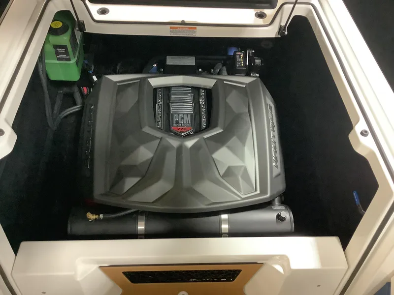 Slide: The Image of 2025 Nautique G25 engine compartment with PCM engine, detailed view. - 26