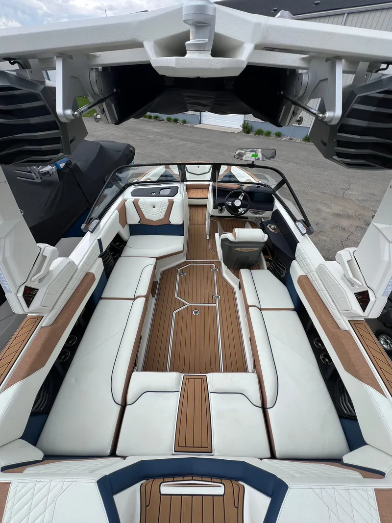 Slide: The Image of 2024 Nautique Super Air G23 interior with luxurious seating and sleek design. - 15