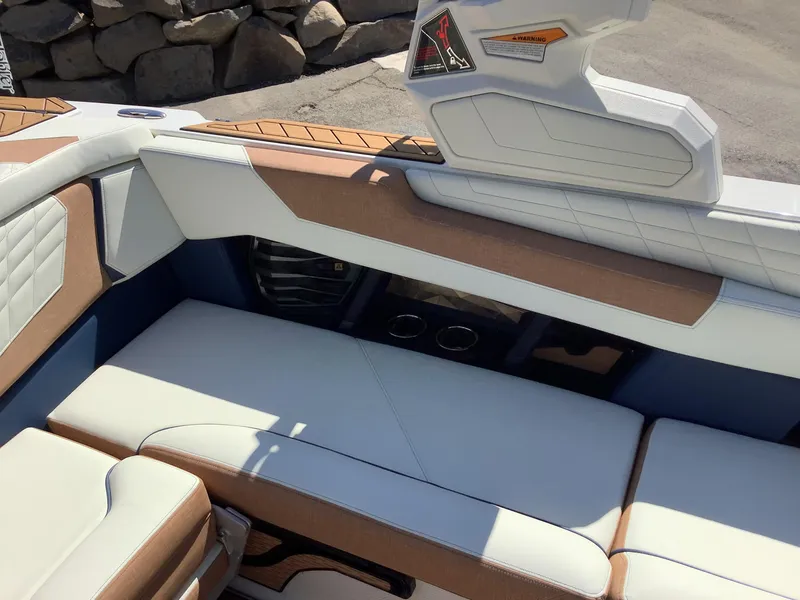 Slide: The Image of 2024 Nautique Super Air G23 interior seating with premium upholstery and modern design. - 19