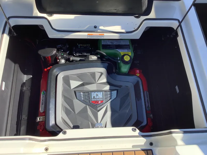 Slide: The Image of 2024 Nautique Super Air G23 engine compartment with PCM engine. - 26