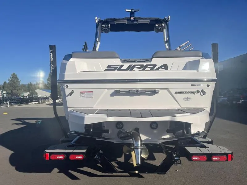 Slide: The Image of 2023 Supra SA 450 boat rear view, showcasing sleek design and powerful features. - 14