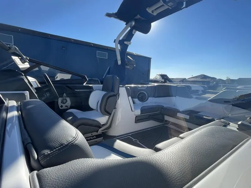 Slide: The Image of 2023 Supra SA 450 boat interior with luxurious seating and modern design. - 9