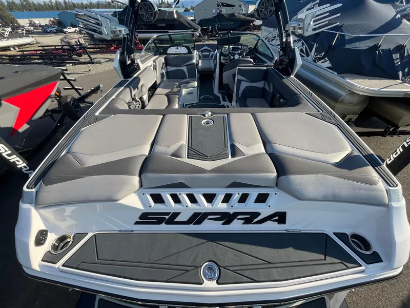 Slide: The Image of 2017 Supra SA 450 boat interior with sleek seating and modern design. - 15