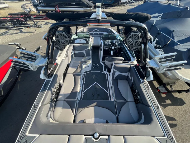 Slide: The Image of 2017 Supra SA 450 boat interior with sleek seating and advanced audio system. - 16