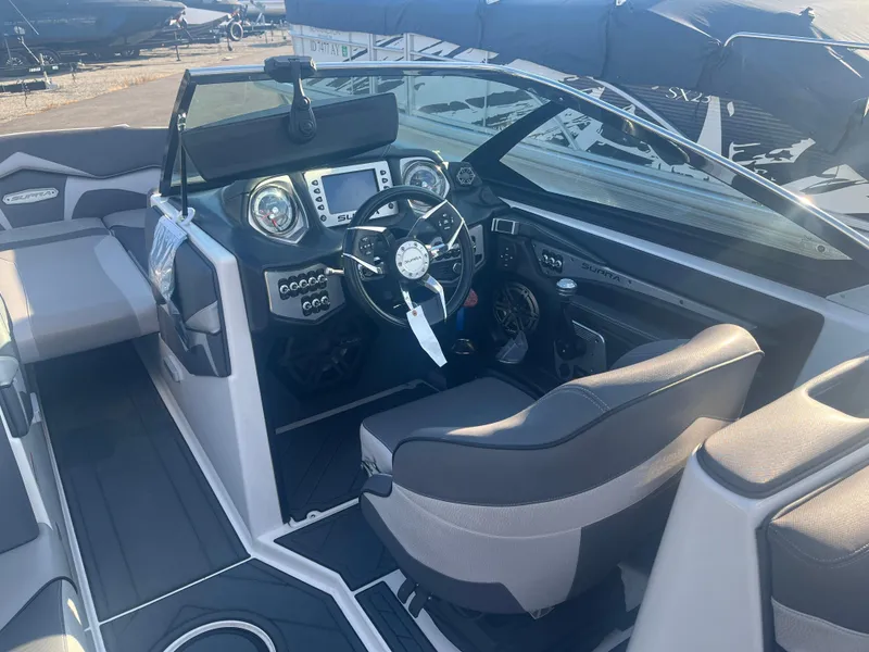 Slide: The Image of 2017 Supra SA 450 boat interior with modern dashboard and steering wheel. - 19