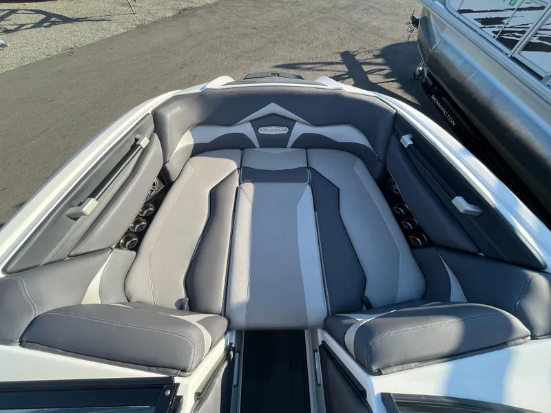 Slide: The Image of 2017 Supra SA 450 boat interior with gray and white cushioned seating. - 26
