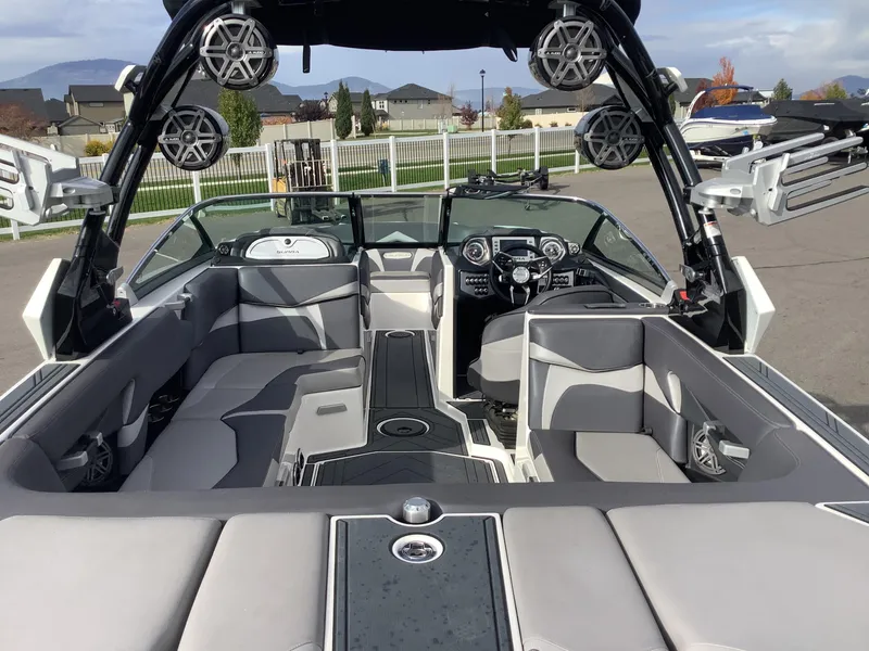 Slide: The Image of 2017 Supra SA 450 boat interior with sleek seating and advanced dashboard. - 35