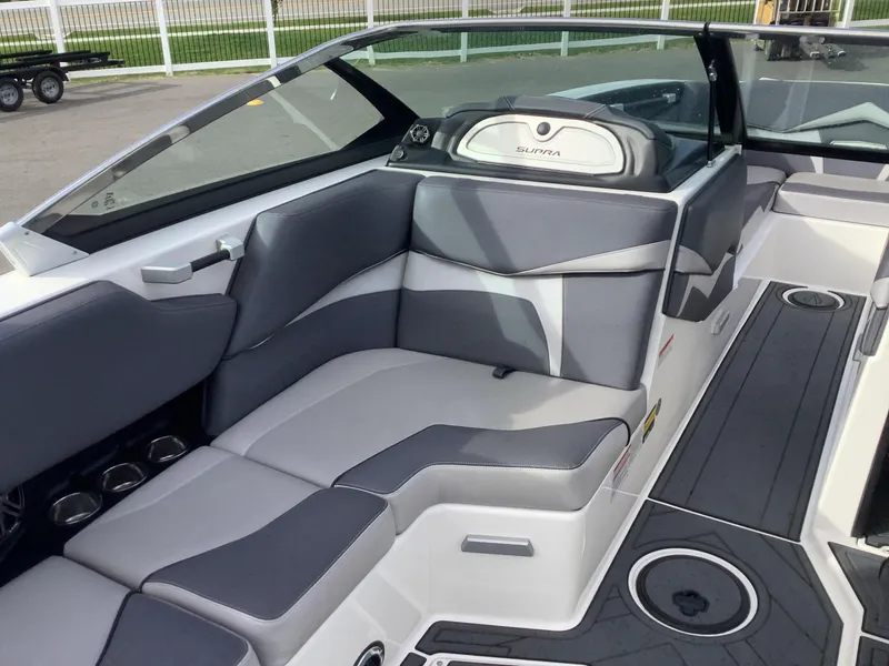 Slide: The Image of 2017 Supra SA 450 boat interior with gray seating and modern design. - 39
