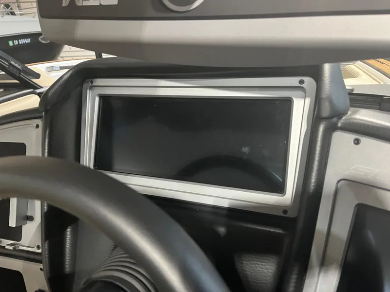 Slide: The Image of 2023 Supra SE 550 dashboard with steering wheel and display screen. - 20