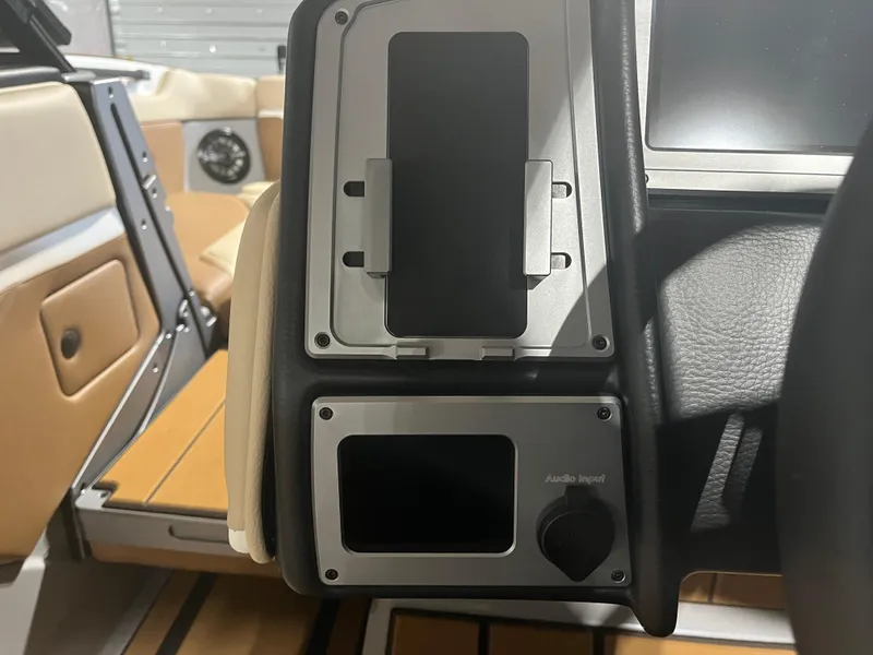 Slide: The Image of 2023 Supra SE 550 interior, featuring audio input and sleek design elements. - 21