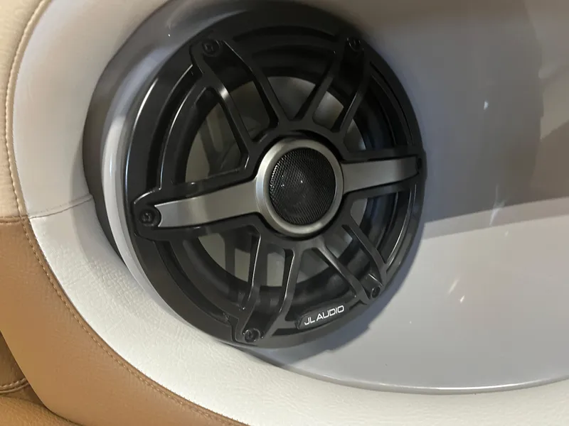 Slide: The Image of JL Audio speaker in 2023 Supra SE 550 boat interior. - 26